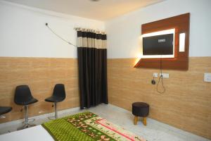 TV a/nebo společenská místnost v ubytování Hotel Starlight