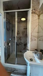 Ένα μπάνιο στο Portobello Guest Rooms