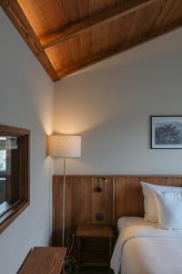 Voodi või voodid majutusasutuse HLS Dalat Lodge toas