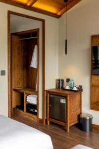 Voodi või voodid majutusasutuse HLS Dalat Lodge toas