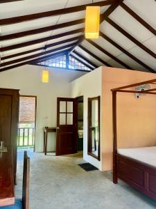 Postel nebo postele na pokoji v ubytování Bali Villa Mirissa