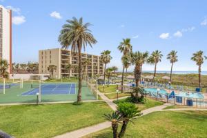 an image of a tennis court at a resort at Saida II Beachfront Oasis in South Padre Island