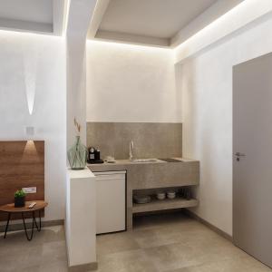 a kitchen with a sink and a counter at Viva Mare Studios in Astypalaia Town