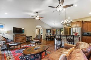 a living room with a couch and a table at Scout's Retreat in Whitefish