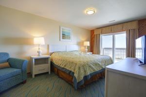 En eller flere senge i et værelse på Ocean Pines Resort by Capital Vacations