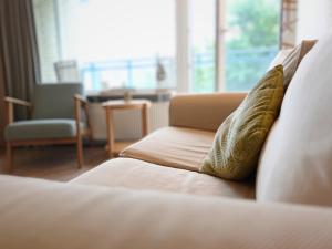 Ruang duduk di Duhnentraum Bestlage ,Meerblick Balkon, Parkplatz, Aufzug, Wlan, Bettwäsche,Handtücher,Netflix uvm