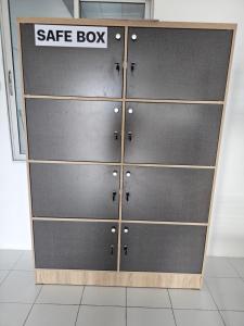 a set of metal doors with a safe box sign on them at JS786 Cafe&Bistro in Pattaya +7 photos