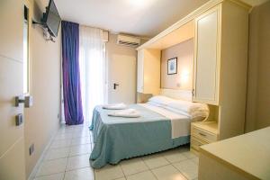Letto o letti in una camera di Di Matteo Hotel