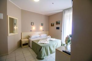 Letto o letti in una camera di Di Matteo Hotel