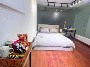 Cama o camas de una habitación en Jun Homestay & Apartment