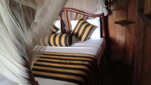 Letto o letti in una camera di Sigiriya Rock Gate Tree House