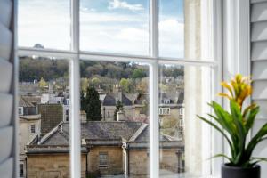 a window with a view of a city at Dream Stays Bath - Beau Street in Bath