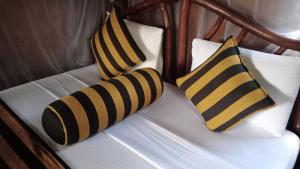 Letto o letti in una camera di Sigiriya Rock Gate Tree House