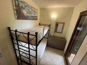 Katil atau katil-katil dalam bilik di Villetta Laura By La Via Del Mare Viaggi e Vacanze +14 gambar