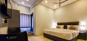 Nova Hotel New Crossroad客房内的一张或多张床位