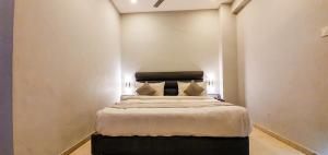 Nova Hotel New Crossroad客房内的一张或多张床位