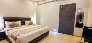 Nova Hotel New Crossroad客房内的一张或多张床位