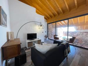 Et tv og/eller underholdning på Casa da Figueira - Guest House