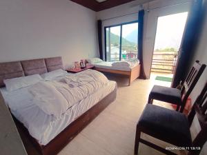 Postel nebo postele na pokoji v ubytování Dev bhoomi resort