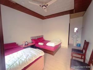 Postel nebo postele na pokoji v ubytování Dev bhoomi resort + 5 fotografií
