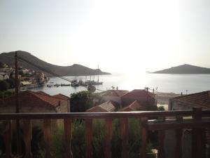 a view of a harbor with boats in the water at Villa Chrysodimi in Halki