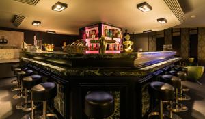 Lounge nebo bar v ubytování De Keyser Hotel