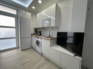 Una cocina o zona de cocina en Apartamento Andalucía 33 Derecha