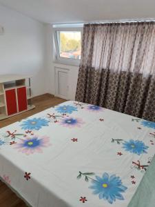 Postel nebo postele na pokoji v ubytování Casa Luminița