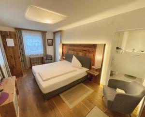 Posteľ alebo postele v izbe v ubytovaní Aparthotel Krösbacher + 36 fotografií
