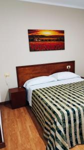 Postel nebo postele na pokoji v ubytování Hotel Nicolaj