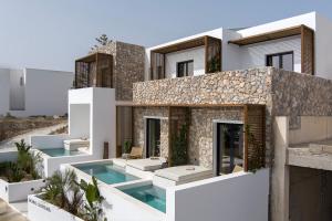 an image of a villa with a swimming pool at Boho Sapiens Sea View in Adamas