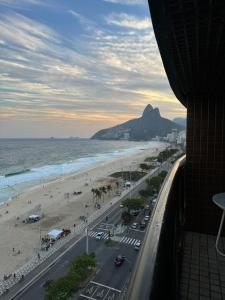 a view of the beach and the ocean from a hotel room at De Frente PRAIA DE IPANEMA, Vista Exclusiva, 2 Piscinas, Academia etc. in Rio de Janeiro