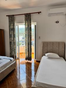 Ένα ή περισσότερα κρεβάτια σε δωμάτιο στο Coastal Bliss Apartment +22 φωτογραφίες