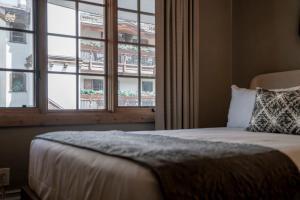 מיטה או מיטות בחדר ב-Lodge at Vail Condominiums