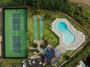 an overhead view of a swimming pool and a resort at Banyan Harbor Resort in Lihue