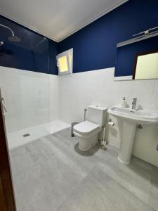 Ένα μπάνιο στο Palmara Las Canteras alquiler por habitación