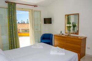 Ένα ή περισσότερα κρεβάτια σε δωμάτιο στο Green Relax Arenella