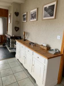 Kuchyň nebo kuchyňský kout v ubytování Appartement tout confort