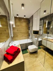 Koupelna v ubytování Apartament Sosnowy Zakątek + 20 fotografií