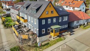 an overhead view of a large house on a street at Hotel-Restaurant Kelter in Esslingen
