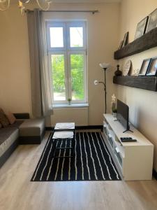 Posedenie v ubytovaní Apartament Mikolowska 9