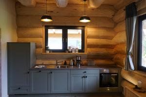 Kuchyň nebo kuchyňský kout v ubytování Tiefenbach-Chalet