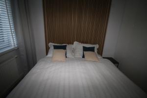 Postel nebo postele na pokoji v ubytování Apartament ARS Platinium Wisła-Spokojna
