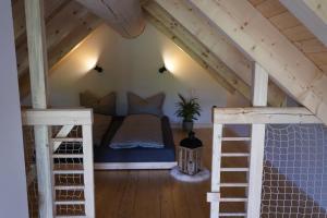 Postel nebo postele na pokoji v ubytování Tiefenbach-Chalet