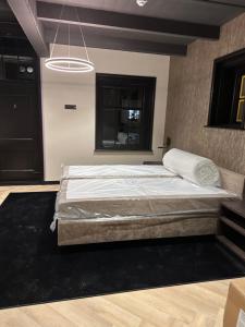 Katil atau katil-katil dalam bilik di Hotel Restaurant Het Witte Paard