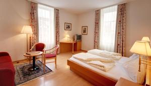 A bed or beds in a room at Postwirt