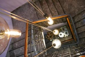 an overhead view of a chandelier hanging from a ceiling at Hotel alla giustizia in Mestre