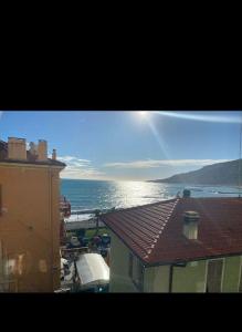 a view of the ocean from a building at Casa Ginny in Ospedaletti