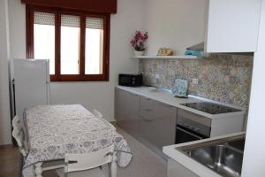 A kitchen or kitchenette at Villa Maria