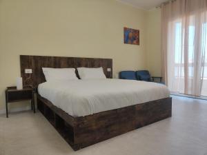 Postel nebo postele na pokoji v ubytování Urban Suite Milano